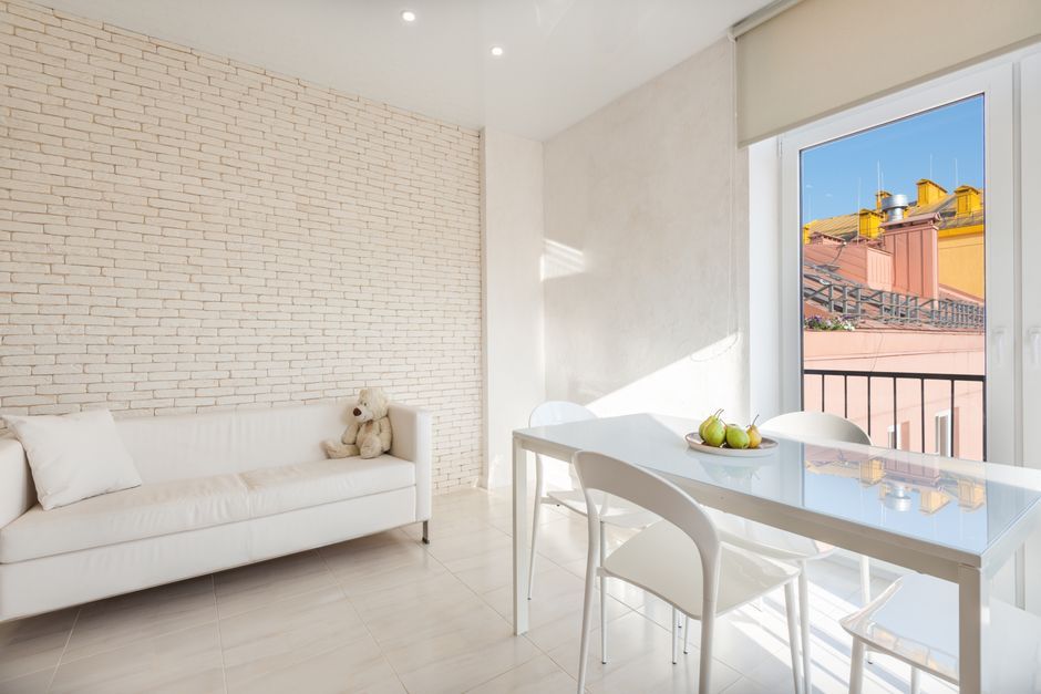 Bright holiday apartment with a view over terracotta rooftops